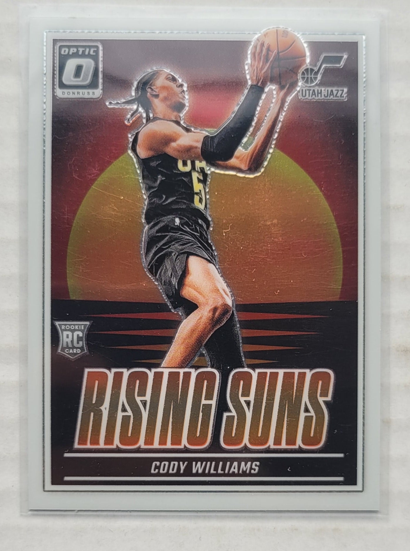 Cody Williams - 2024-25 Donruss Optic Rising Suns #8