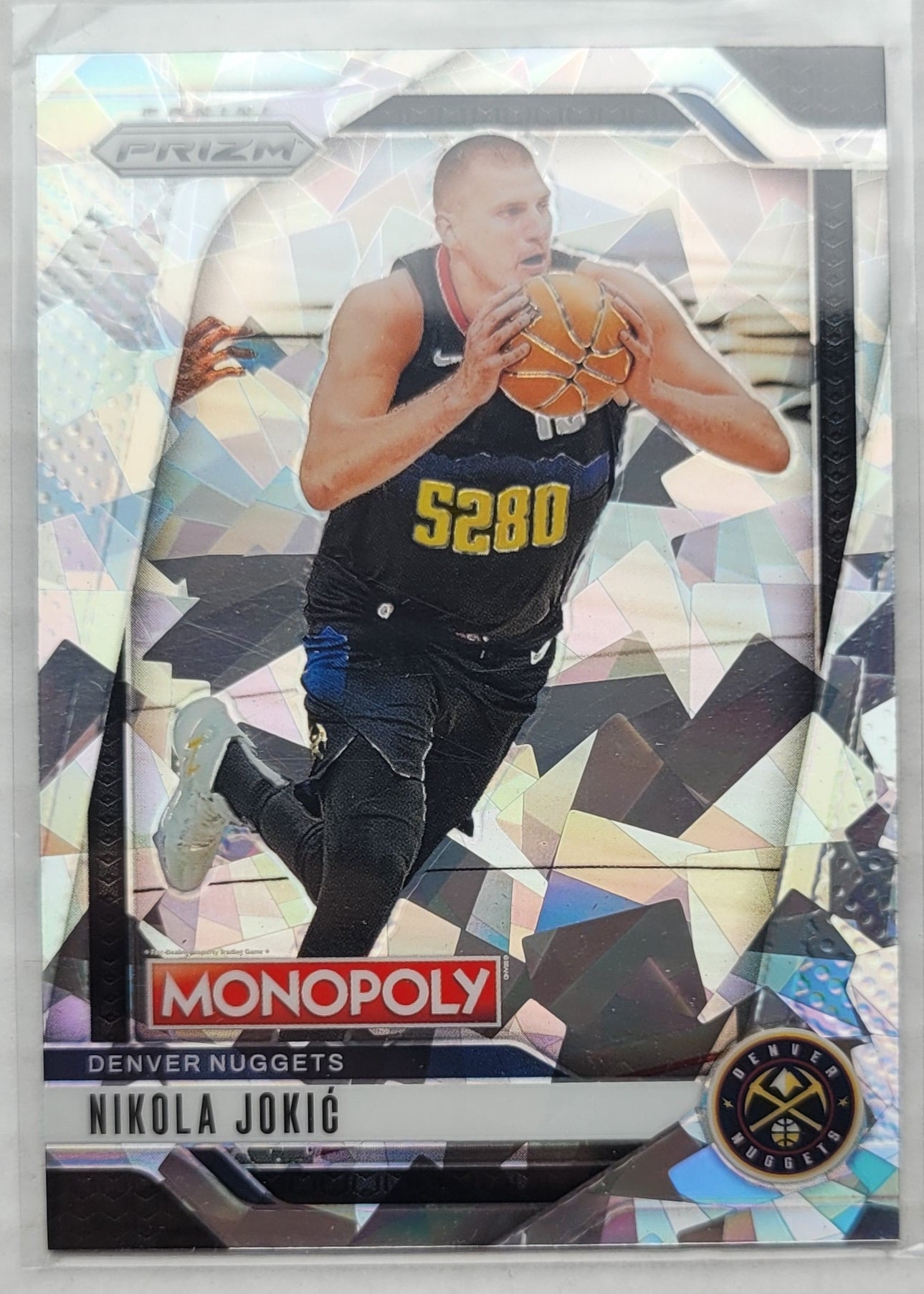 Nikola Jokic - 2024-25 Panini Prizm Monopoly White Cracked Ice #55