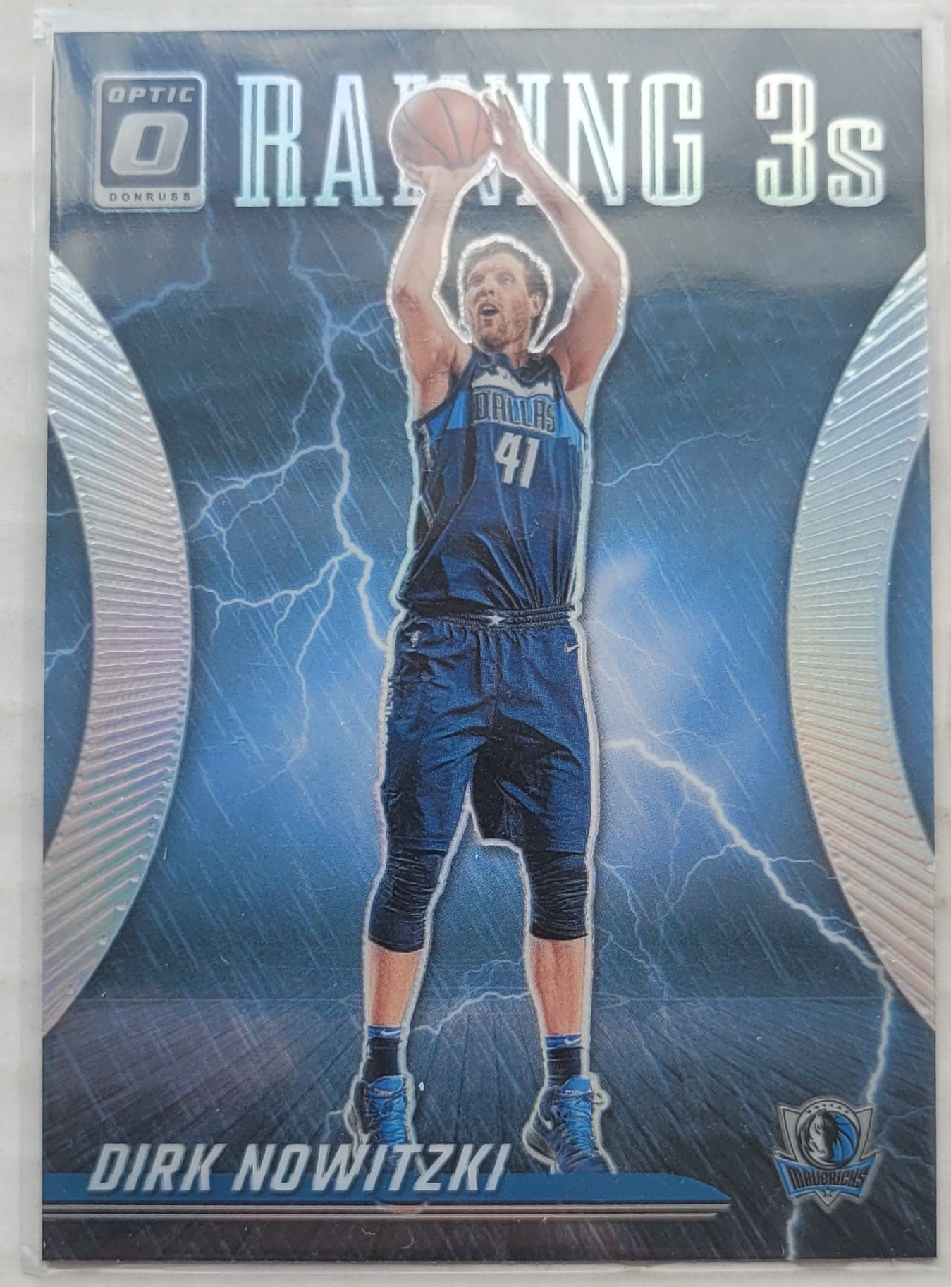Dirk Nowitzki - 2023-24 Donruss Optic Raining 3s Holo #10
